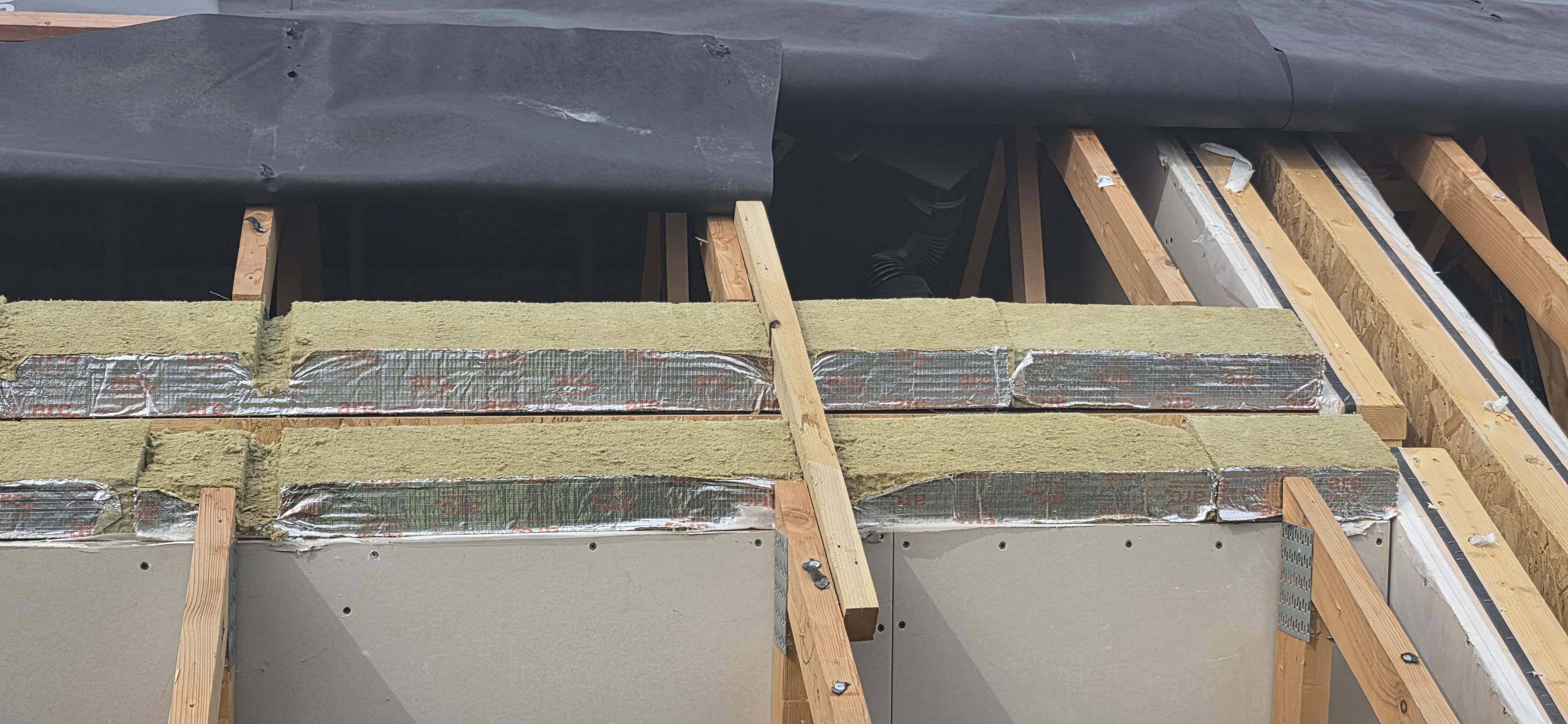 Roof insulation and junction details at The Courtyards