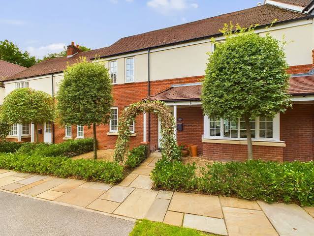 Homes and landscaped front gardens at Kingswood Park