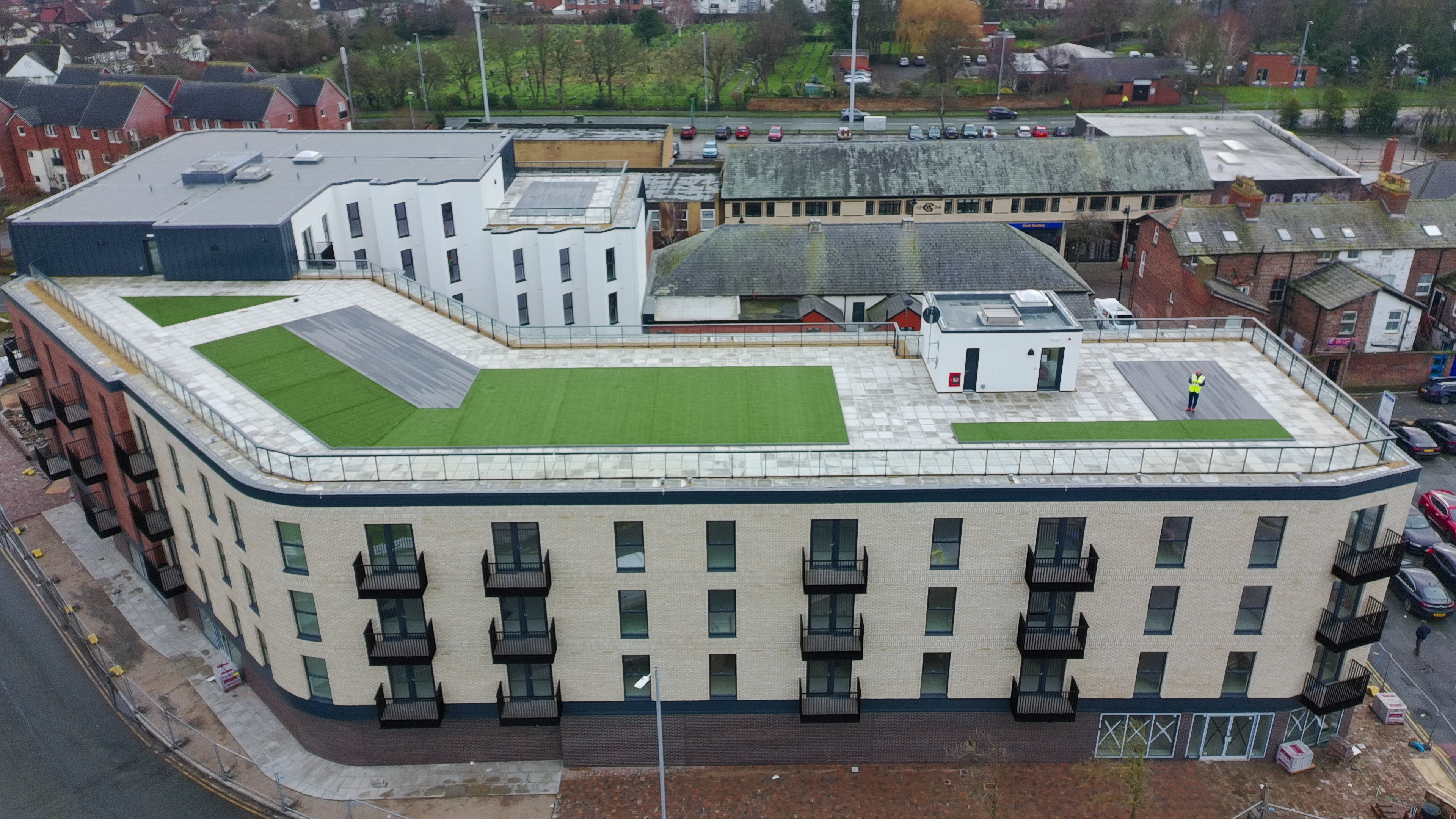 Roof terrace and street-facing apartments at Moorside Place