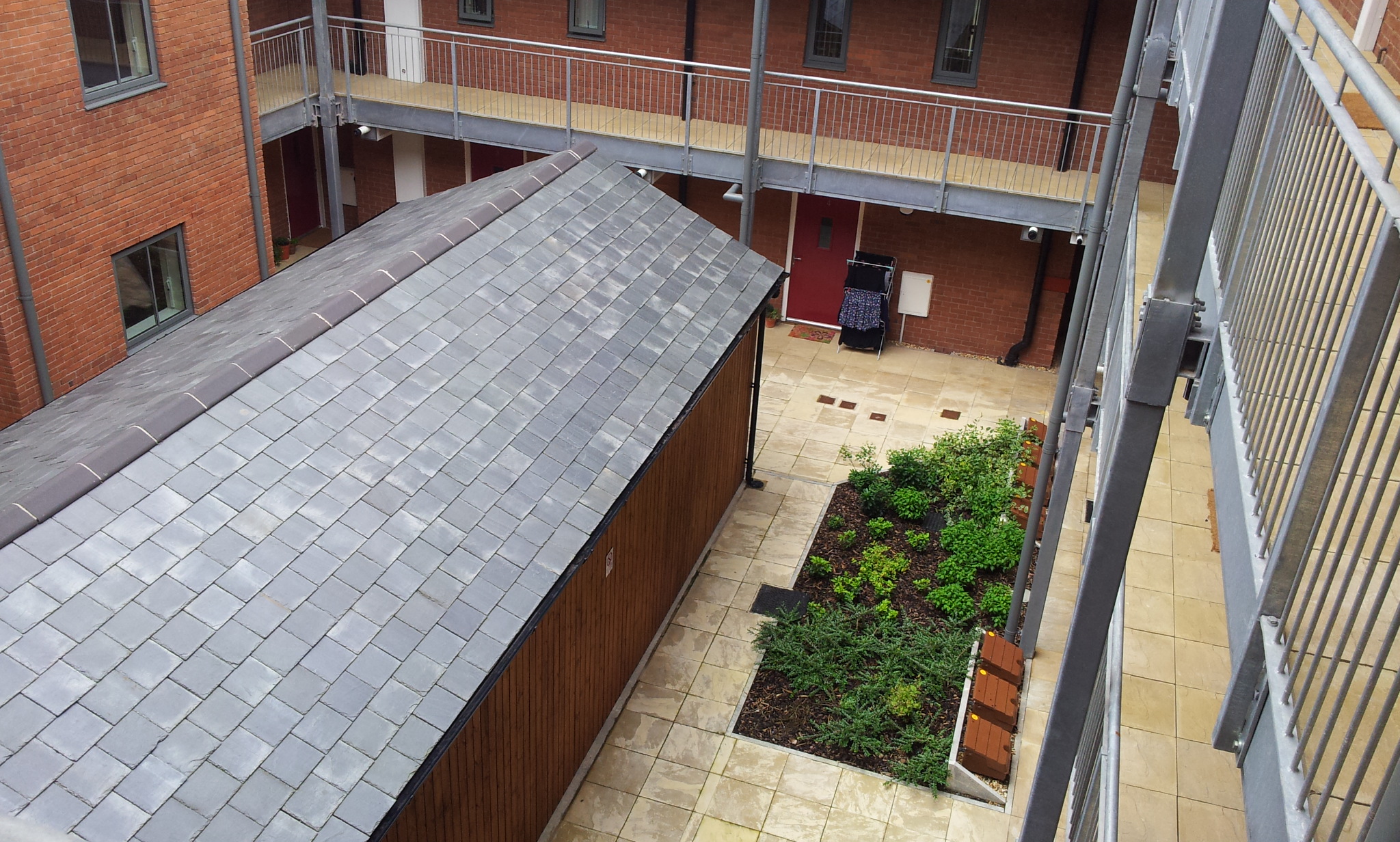 Courtyard landscaping and upper-level access at Old Post Office, Chester