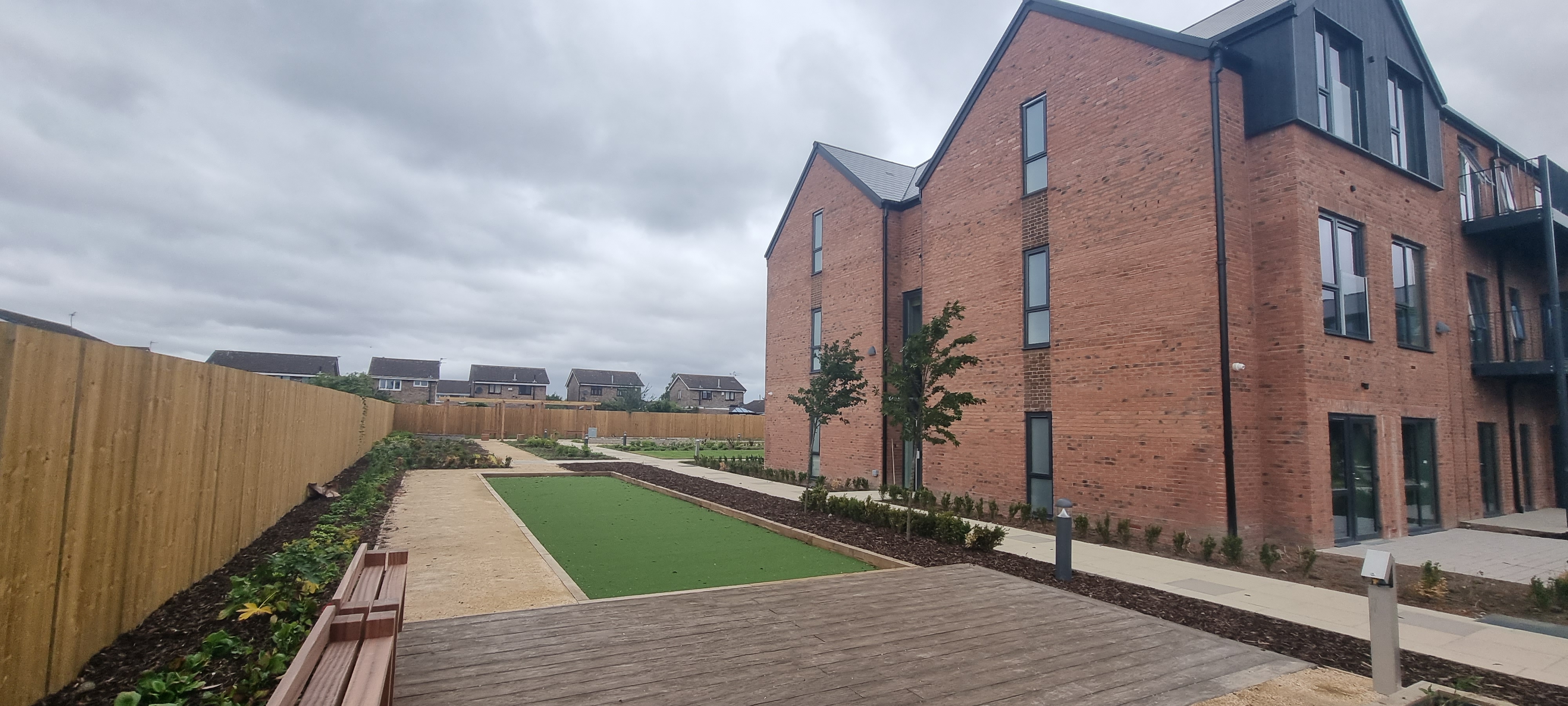 Garden paths and outdoor seating areas at Poppyfields