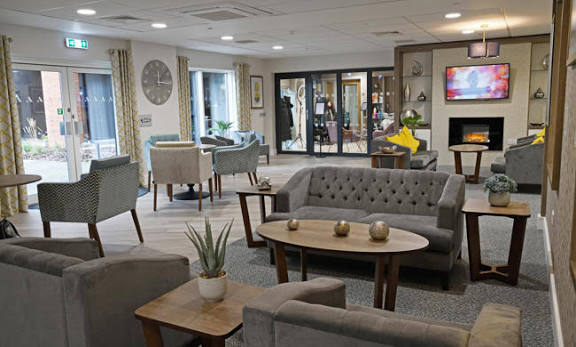 Communal lounge and seating areas at Poppyfields