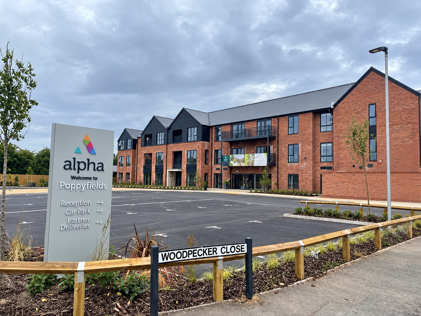 Poppyfields building and entrance sign with vehicles digitally removed